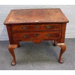 A George II crossbanded walnut lowboy with pair of frieze drawers on pad feet,