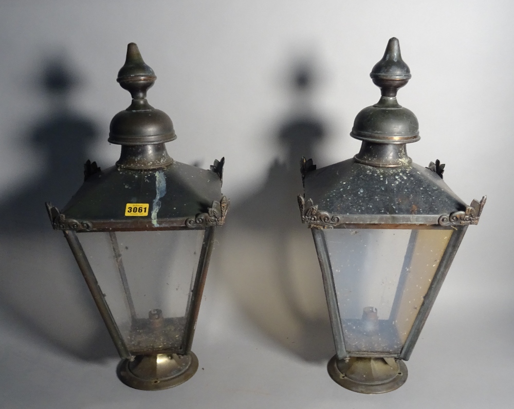 A pair of modern metal lanterns of tapering square form, 56cm high (2).