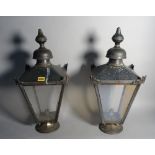 A pair of modern metal lanterns of tapering square form, 56cm high (2).