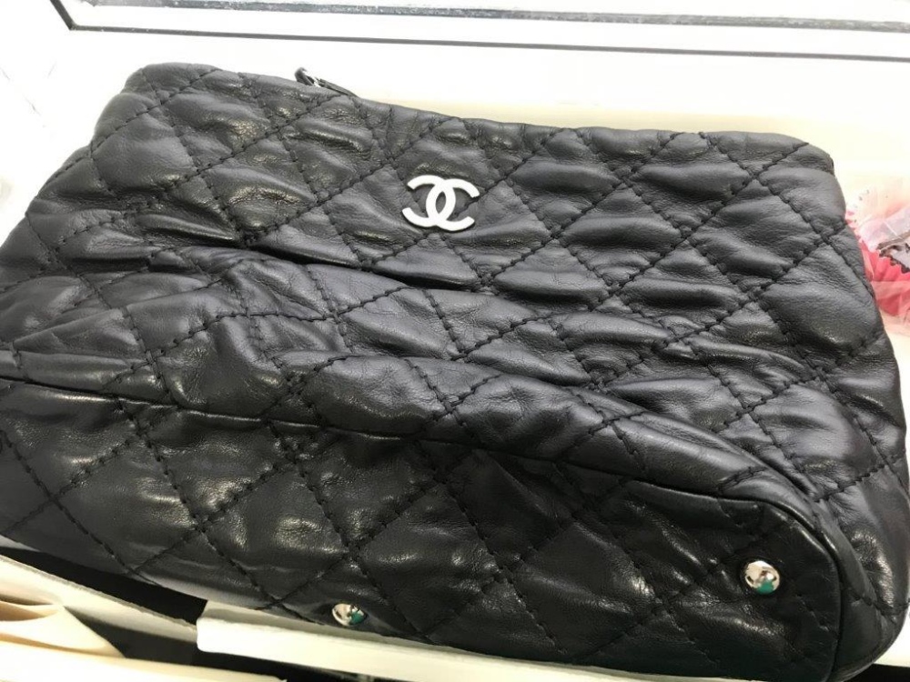 A Chanel black quilted leather tote bag, circa 2012-2013, with silver-tone hardware, - Image 13 of 13