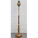 A late Victorian pottery and brass adjustable standard lamp,