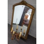 A Victorian girandole gilt framed wall mirror with arch top over triple branch candle sconce,