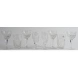 A part suite of cut glass drinking glasses, comprising; ten white wine glasses, 15cm.