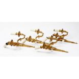 A set of four 20th century gilt metal twin branch wall lights in the 18th century style, 36cm high.