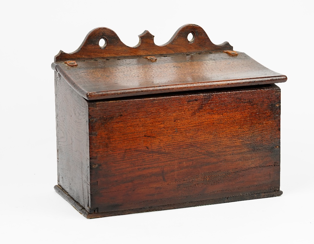 A George III oak candle box, the pierced and shaped back over a sloped front, 38cm wide x 31cm long. - Image 5 of 5