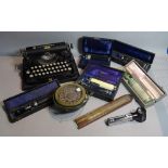 Collectables including an early 20th century portable typewriter, 30cm wide,