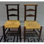 A near pair of 19th century stained pine ladderback chapel chairs, 41cm wide x 83cm high, (2).