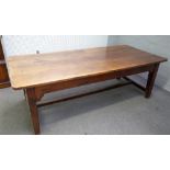 A 19th century oak kitchen table, the rectangular plank top on square supports,