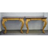 A pair of William IV giltwood console tables, with channelled friezes,