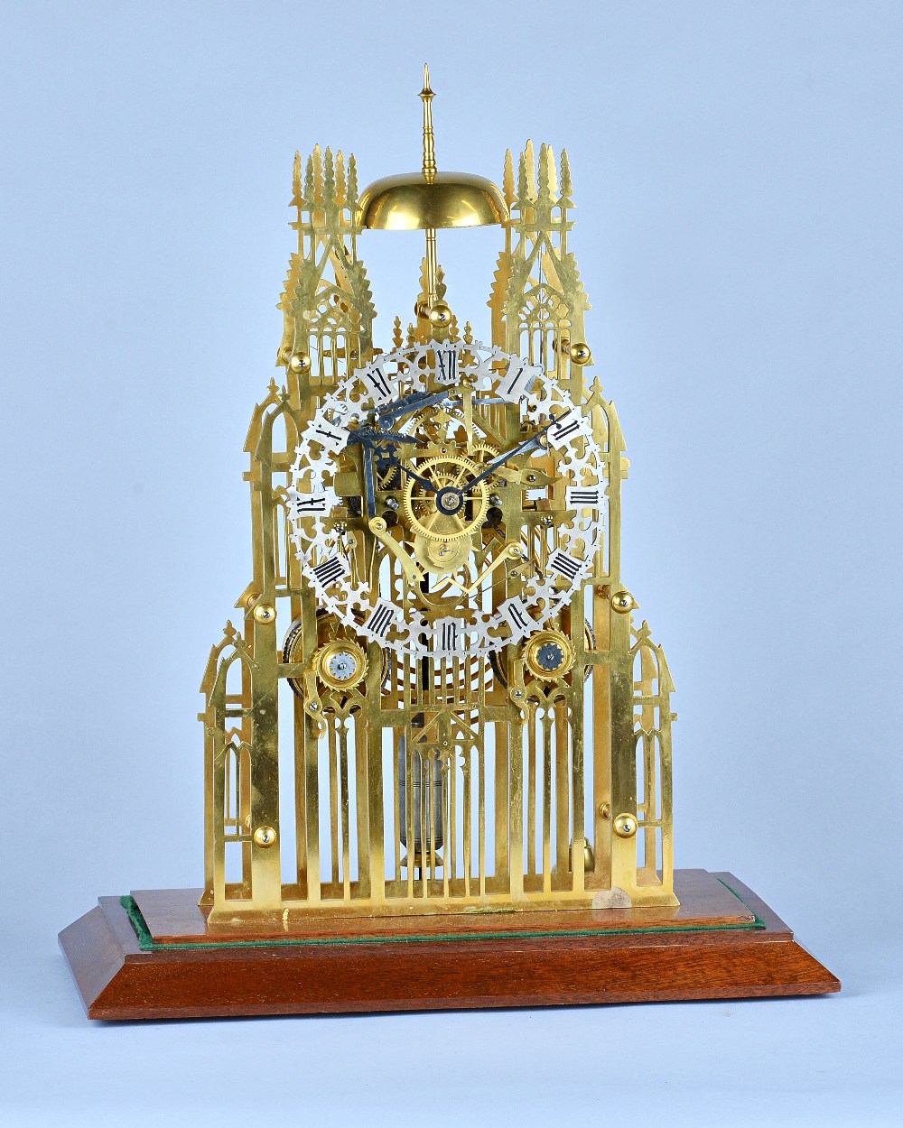 A late Victorian 'York Minster' brass Skeleton clock With twin chain fusee movement with anchor