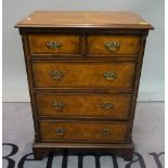 A George II style walnut side chest of two short and three long drawers on bracket feet,
