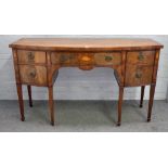 A George III style mahogany bowfront sideboard, with single drawer flanked by cupboards,