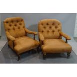 A near pair of Victorian mahogany framed low armchairs on turned supports, 75cm wide x 86cm high,