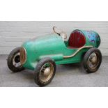 A 1950s Triang Super 8 Racer pedal car, repainted in green, with four 13inch pneumatic tyres,