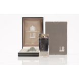 A Dunhill silver plated 'unique' gas lighter, with box, booklet and outer box.