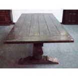 A 17th century style oak refectory table,