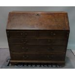 A mid-18th century mahogany bureau with fitted interior and ogee bracket feet,