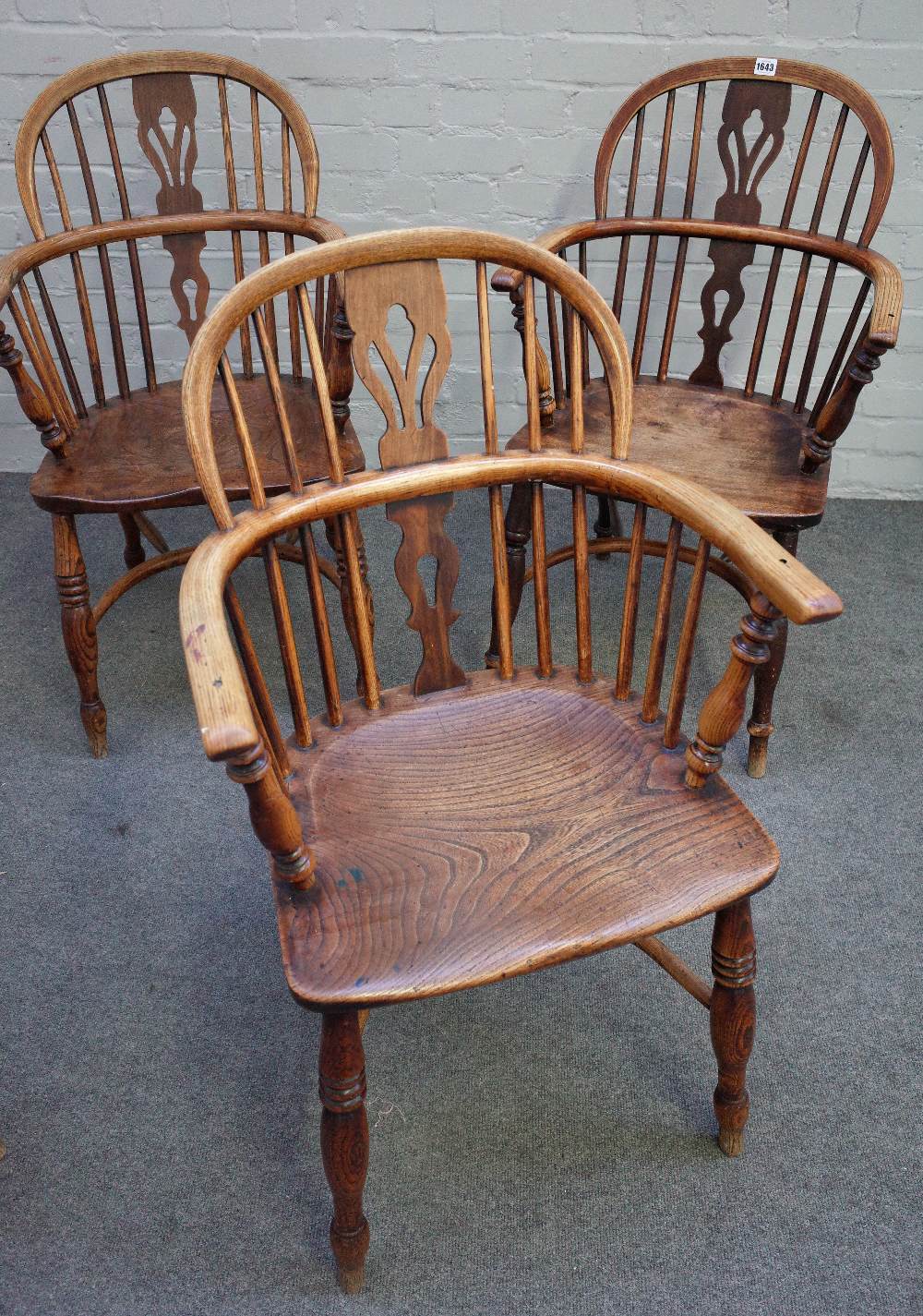A set of three ash and elm Windsor elbow chairs, 19th century, with pierced splats, - Image 4 of 5