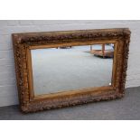 A Victorian rectangular gilt gesso frame,