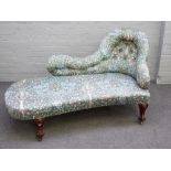 A small Victorian spoonback chaise longue with William Morris upholstery on faux rosewood scroll