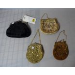 A group of four early 20th century lady's coin purses, one by 'D.H.