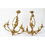 A pair of 20th century gilt metal five branch chandeliers and ceiling roses, in the rococo style,