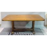An Art Deco style rectangular walnut dining table,
