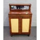 A Regency brass inlaid rosewood and mahogany chiffonier with mirrored ledge back over a pair of