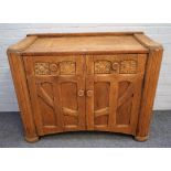 An Arts & Crafts design stripped oak sideboard with pair of 'tree of life' carved drawers over