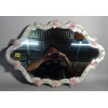 A 20th century Venetian style lozenge shape wall mirror, 67cm high x 45cm wide.