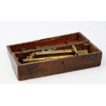 A 19th century brass surveyors telescope by Troughton & Simms, London, cased.