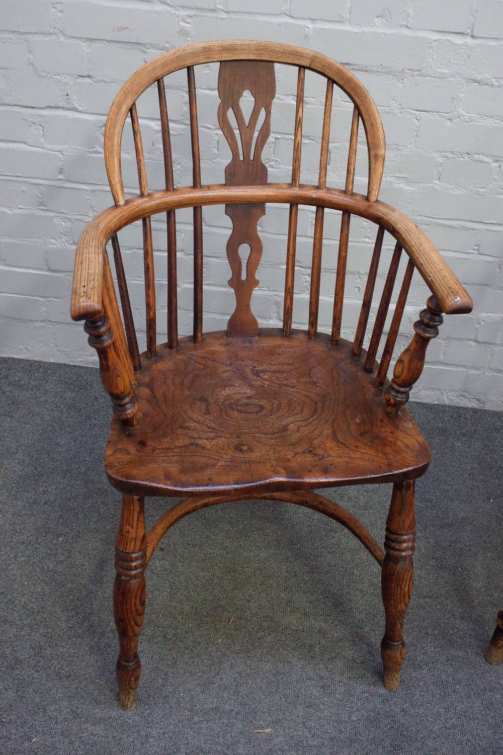 A set of three ash and elm Windsor elbow chairs, 19th century, with pierced splats, - Image 2 of 5