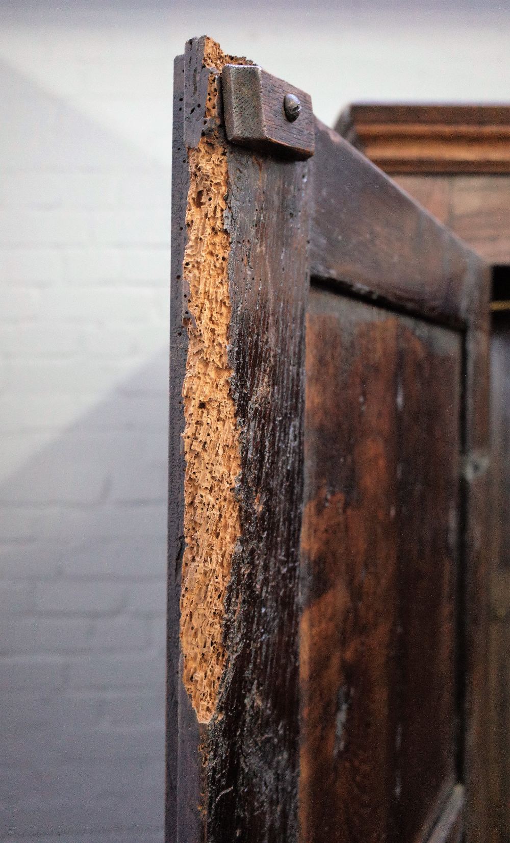 A 17th century style oak hanging cupboard, of panelled construction, incorporating earlier elements, - Image 3 of 6