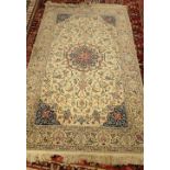 A fine part silk Nain rug, Persian, the ivory field with a central rosette medallion,