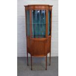 An Edwardian inlaid satinwood serpentine fronted display cabinet/cupboard on tapering square