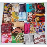 A collection 1960s and 1970s printed silk scarves,