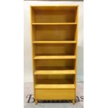 G-Plan, a modern oak bookcase with single drawer base on tapering supports, 80cm wide x 185cm high.