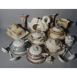 Ceramics, including a modern hanging lantern formed as a swan, a pair of ceramic wall appliques,