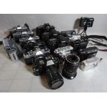 A quantity of mostly modern cameras, including Canon Pentax, Nikon and sundry (qty).