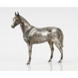 A silver model of a standing horse, London 1981, height 23cm, maker Asprey & Co Ltd,