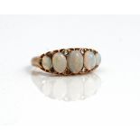 A late Victorian 9ct gold and opal five stone ring,