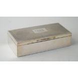 A silver rectangular table cigarette box, wooden lined within,