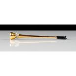 An Asprey 9ct gold, platinum and diamond mounted lady's cigarette holder,