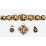 A 19th century Austro-Hungarian gilt metal and gem set parure, comprising a bracelet,