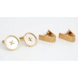 A pair of 9ct gold V shaped cufflinks, with engine turned decoration,