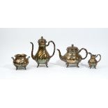 A French four piece tea and coffee set, comprising; a teapot, a coffee pot,