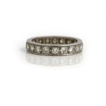 A platinum and diamond full eternity ring, mounted with circular cut diamonds,