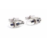 A pair of white gold, diamond and blue gem set dress cufflinks, with oval fronts,