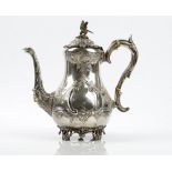 A late Victorian Irish silver coffee pot, of baluster form with floral,