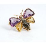 An amethyst citrine and agate brooch designed as a butterfly,